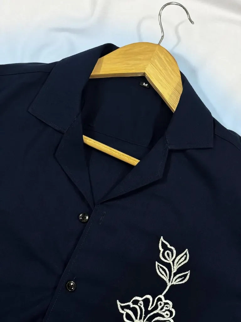 _Navy Cuban Collar Drop Shoulder Shirt. Finished with delicate floral embroidery. Available in S.webp